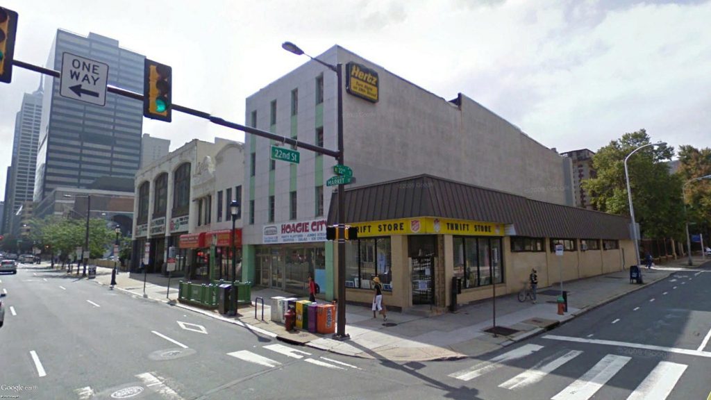 The vacant building on the left of the Salvation Army prior to the start of demolition activities