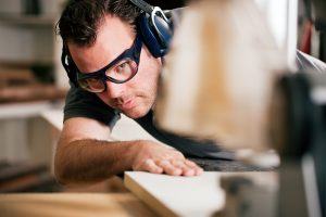 man wearing hearing protection in the workplace