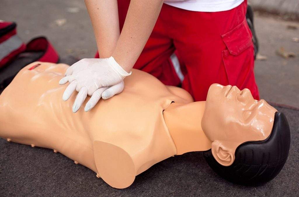 person practicing cpr training