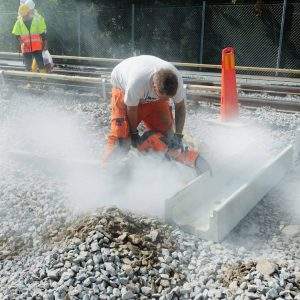 person failing to use protection from respirable silica while cutting concrete