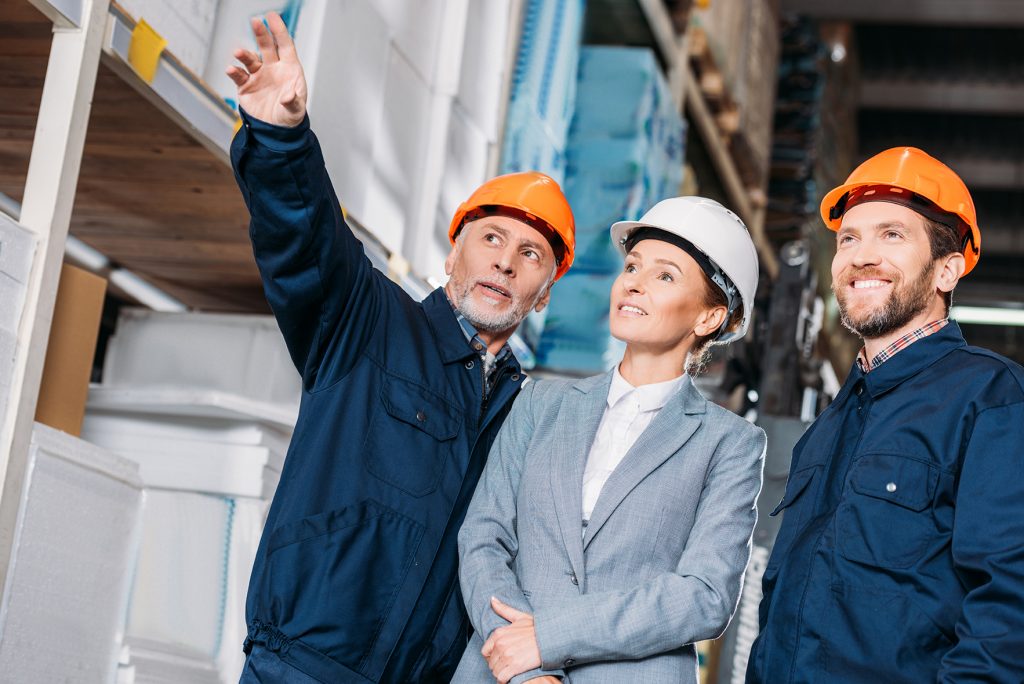 industrial hygene inspectors examining machinery